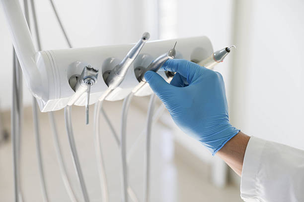 Professional Tooth Extraction technician working in Dexter, MI
